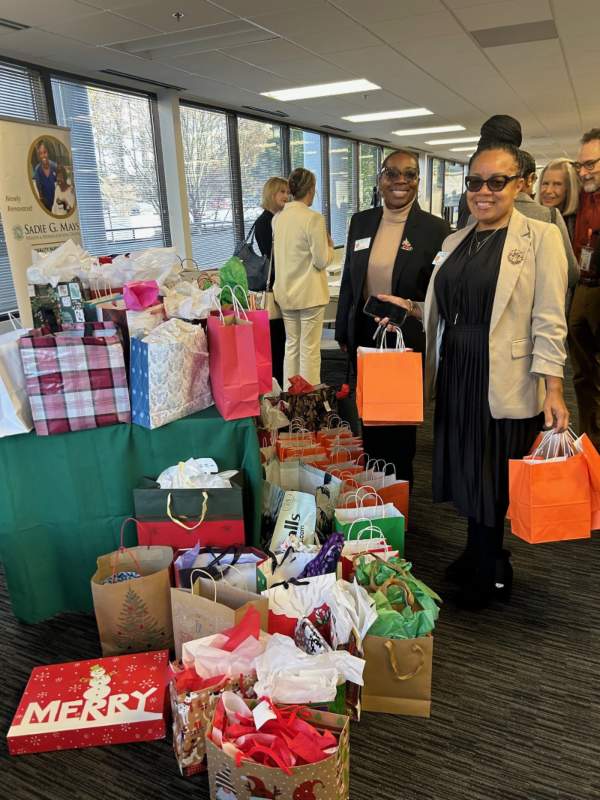 Website 2026 ASCNN Members Bringing Gifts 1